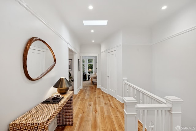 1980-1982 Fell St, San Francisco, CA 94117 - hallway featuring an upstairs landing, recessed lighting, light wood-style floors, and a skylight