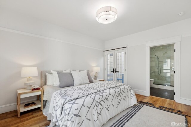 1980-1982 Fell St, San Francisco, CA 94117 - bedroom with french doors, wood finished floors, access to exterior, and baseboards