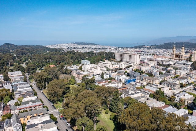 1980-1982 Fell St, San Francisco, CA 94117 - aerial view of property and surrounding area featuring nearby urban area and mountains