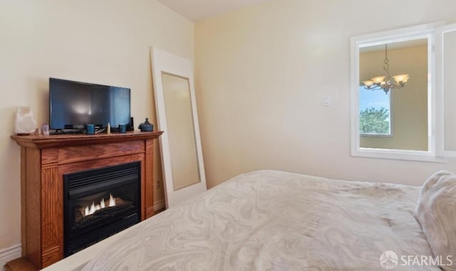 bedroom with an inviting chandelier