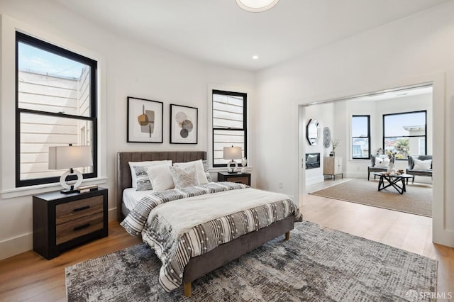 bedroom with light wood-type flooring