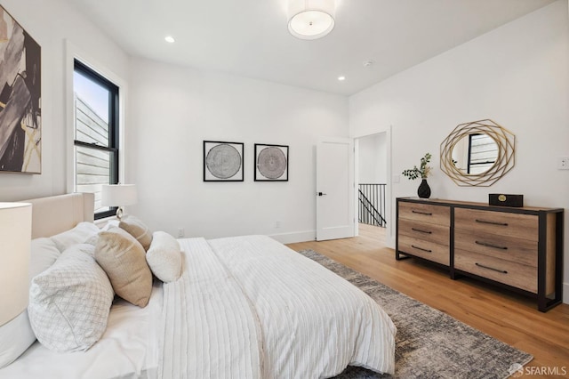 bedroom with light wood-type flooring