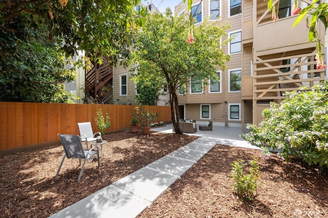 view of community featuring outdoor lounge area and a patio