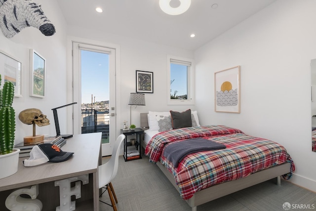 bedroom featuring multiple windows