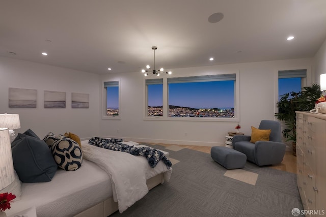 bedroom featuring an inviting chandelier