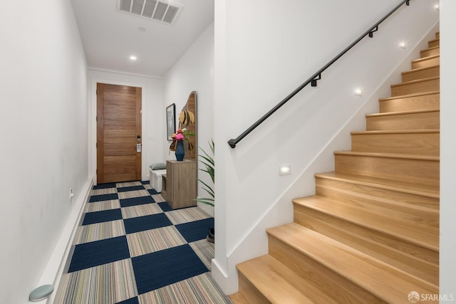 foyer with carpet