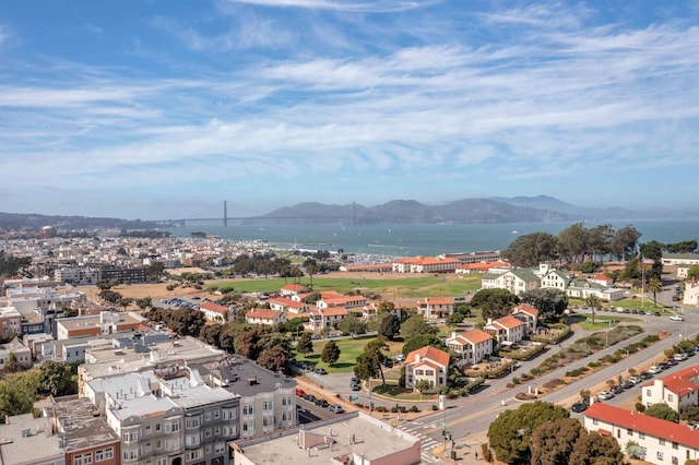 bird's eye view with a water and mountain view