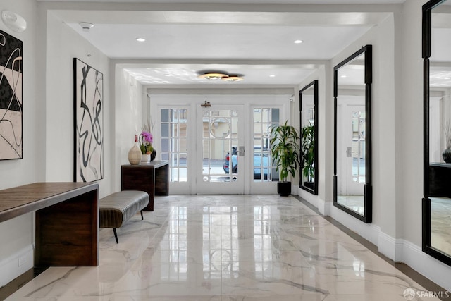 entryway featuring french doors