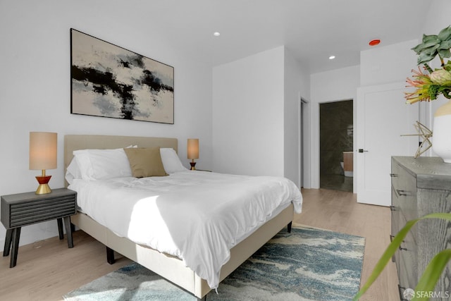 bedroom featuring light hardwood / wood-style floors