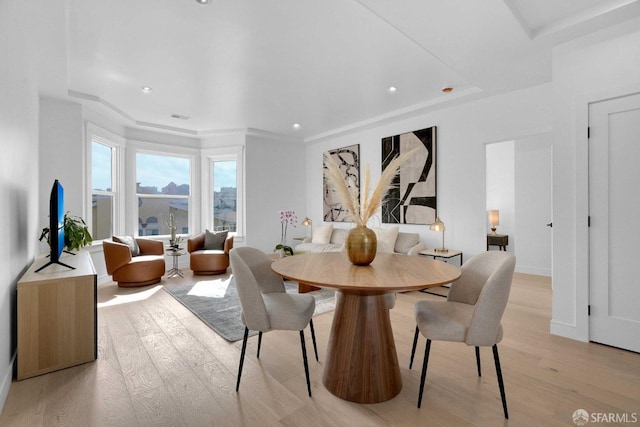 dining area featuring light wood-type flooring