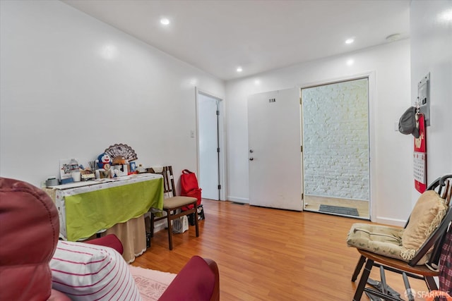 living area featuring recessed lighting and wood finished floors
