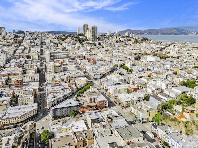 bird's eye view featuring a city view and a water and mountain view