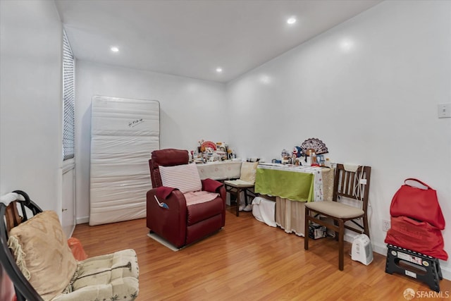 sitting room with recessed lighting and wood finished floors