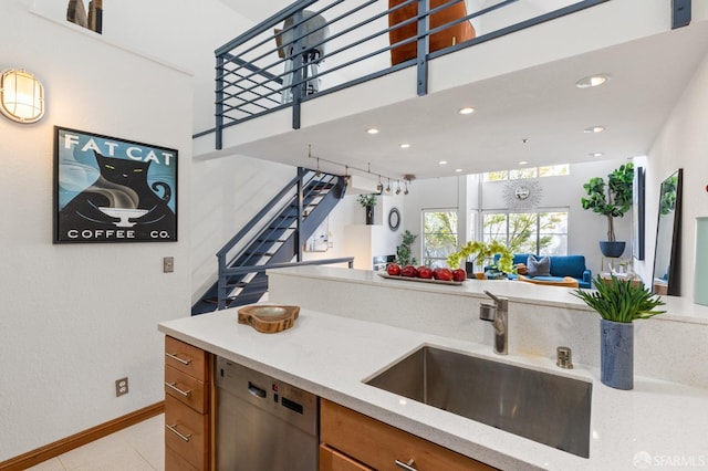 kitchen featuring dishwasher and sink