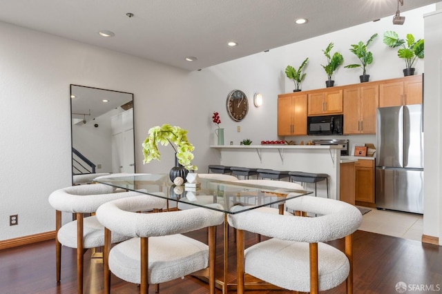 dining room featuring light hardwood / wood-style flooring