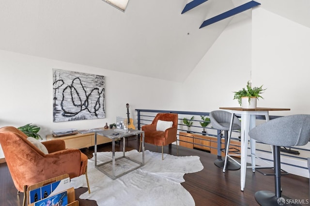 office space featuring hardwood / wood-style flooring, beam ceiling, and high vaulted ceiling