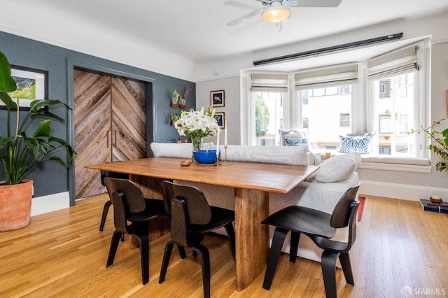 1490 Francisco St Unit 3, San Francisco, CA 94123 - dining area with baseboards, light wood-type flooring, and a ceiling fan