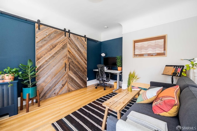 1490 Francisco St Unit 3, San Francisco, CA 94123 - living area with wood finished floors, a barn door, and a desk