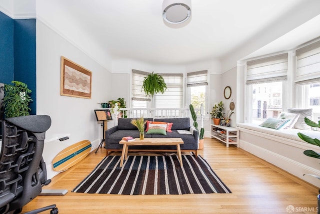 1490 Francisco St Unit 3, San Francisco, CA 94123 - sitting room featuring healthy amount of natural light and wood finished floors