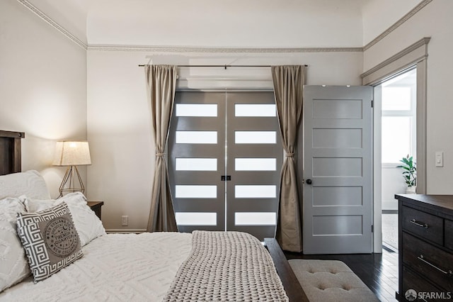 bedroom featuring dark hardwood / wood-style flooring