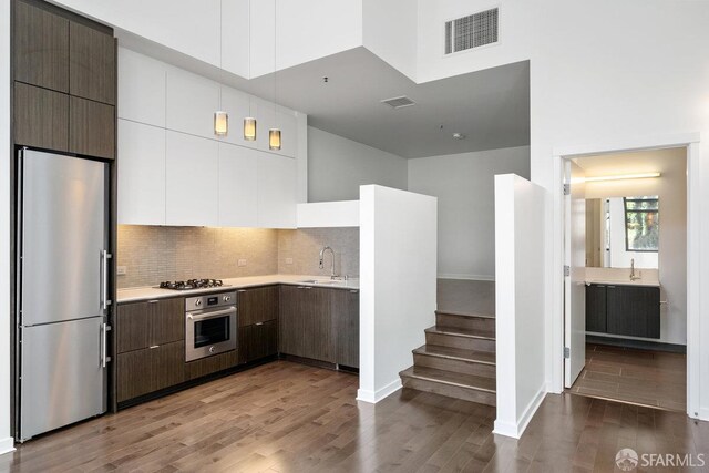 1788 Clay St Unit 103, San Francisco, CA 94109 - kitchen featuring stainless steel appliances, a sink, modern cabinets, and light countertops