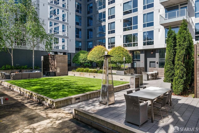 1788 Clay St Unit 103, San Francisco, CA 94109 - view of property's community with outdoor dining space, a yard, a patio, and outdoor lounge area