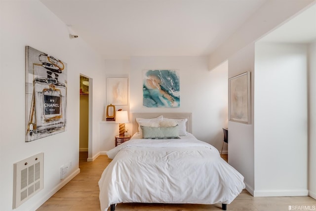 bedroom featuring light wood-type flooring