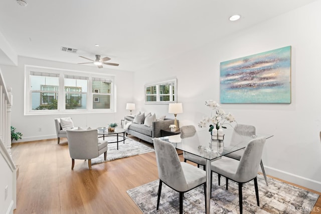 dining room featuring visible vents, baseboards, ceiling fan, recessed lighting, and light wood-style flooring