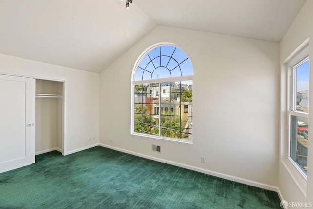 47 Brunswick St, San Francisco, CA 94112 - unfurnished bedroom featuring dark carpet, baseboards, lofted ceiling, and visible vents