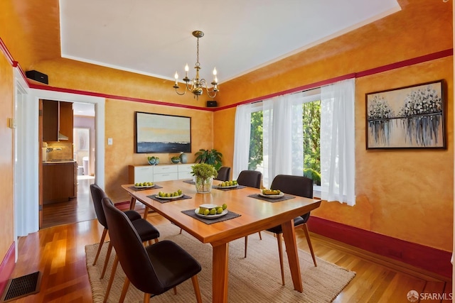 47 Brunswick St, San Francisco, CA 94112 - dining space featuring light wood-style floors, baseboards, a chandelier, and visible vents