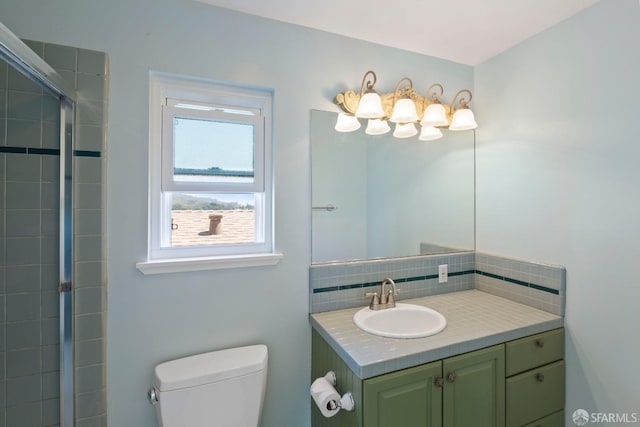 47 Brunswick St, San Francisco, CA 94112 - full bathroom featuring a tile shower, toilet, tasteful backsplash, and vanity