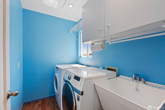 47 Brunswick St, San Francisco, CA 94112 - washroom featuring baseboards, dark wood finished floors, a sink, cabinet space, and independent washer and dryer