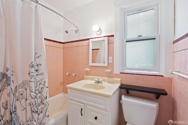 47 Brunswick St, San Francisco, CA 94112 - bathroom with toilet, tile walls, plenty of natural light, and shower / tub combo
