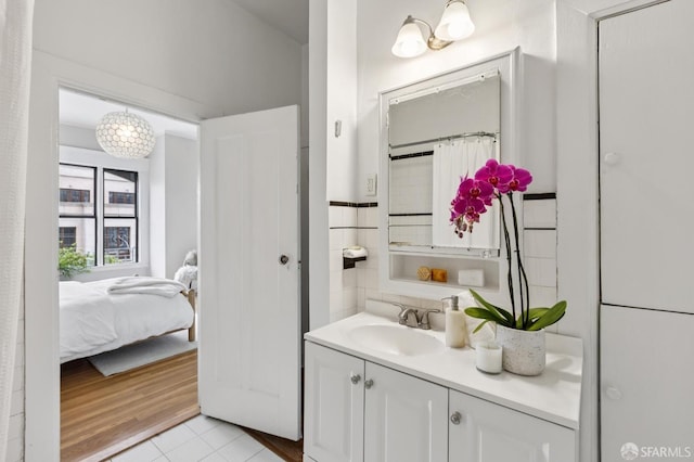 1250 Vallejo St Unit 1, San Francisco, CA 94109 - bathroom featuring vanity, tile patterned flooring, and a chandelier