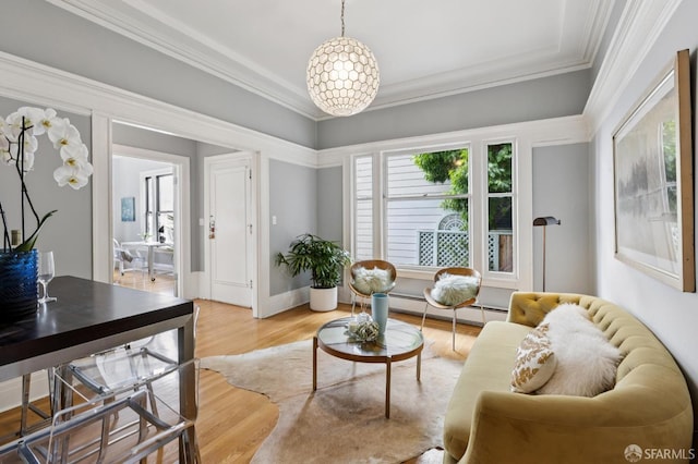 1250 Vallejo St Unit 1, San Francisco, CA 94109 - living room featuring baseboard heating, ornamental molding, and light wood-type flooring