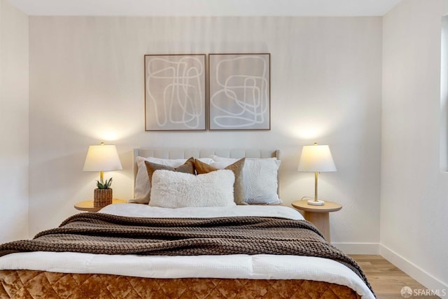 bedroom featuring light wood-type flooring