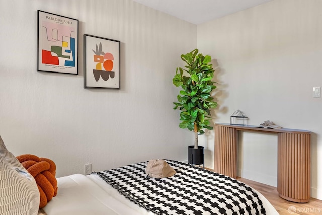 bedroom featuring light wood-type flooring