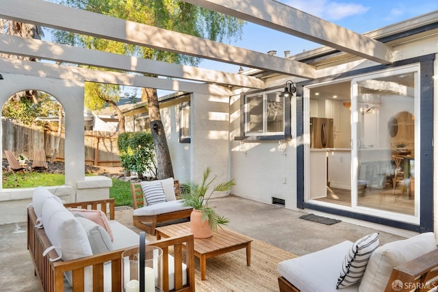 view of patio featuring a pergola and an outdoor living space