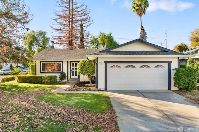 ranch-style home with a garage