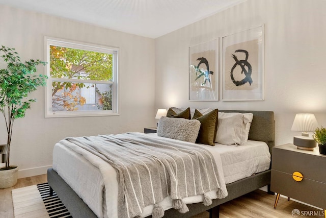 bedroom featuring light hardwood / wood-style floors