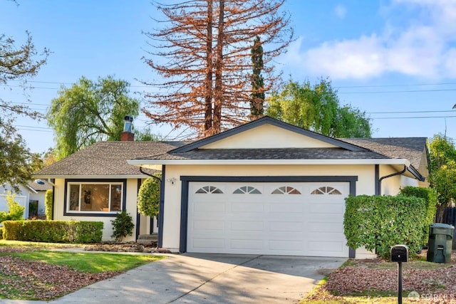 ranch-style home with a garage