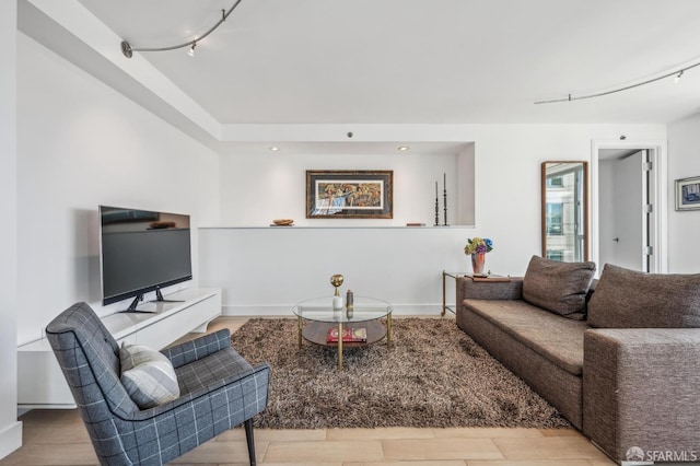 229 Brannan St Unit 11J, San Francisco, CA 94107 - living area featuring track lighting and wood finished floors