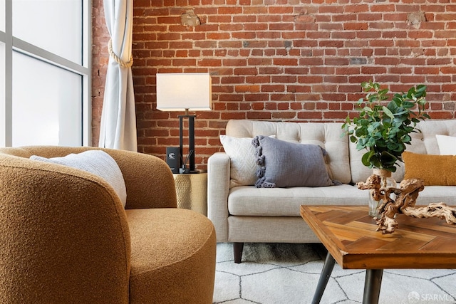 living room with brick wall