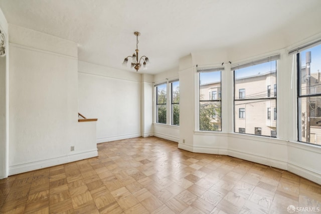1385-1387 Vallejo St, San Francisco, CA 94109 - unfurnished room with a chandelier and baseboards