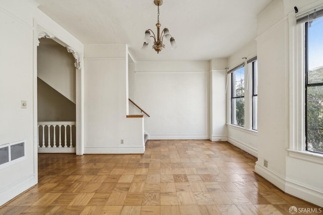 1385-1387 Vallejo St, San Francisco, CA 94109 - unfurnished dining area with a chandelier, plenty of natural light, and stairs