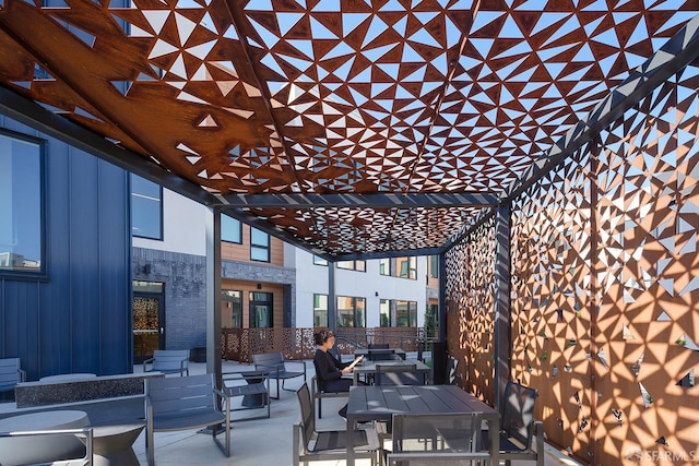 view of patio with a pergola and an outdoor living space