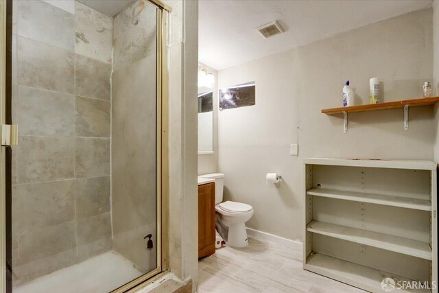558 A St, Hayward, CA 94541 - full bath featuring vanity, baseboards, visible vents, a stall shower, and toilet