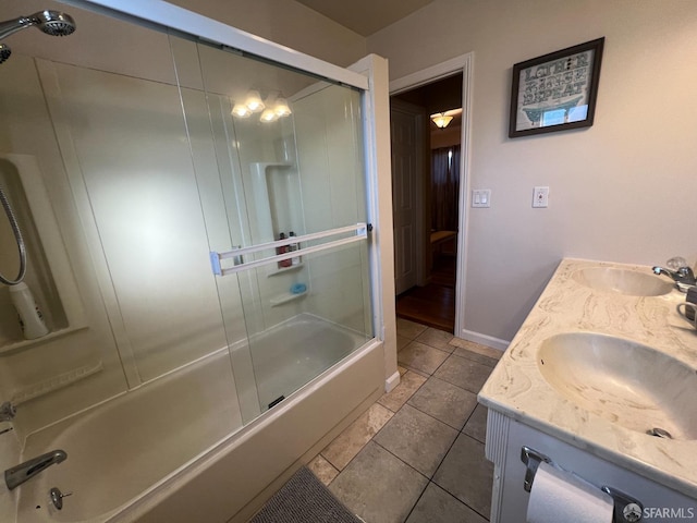 558 A St, Hayward, CA 94541 - bathroom featuring a sink, double vanity, combined bath / shower with glass door, and tile patterned flooring