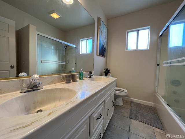 558 A St, Hayward, CA 94541 - bathroom featuring tile patterned flooring, double vanity, toilet, and a sink