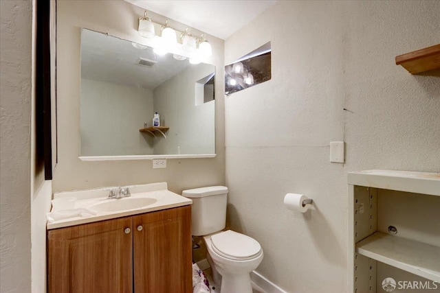 558 A St, Hayward, CA 94541 - bathroom featuring visible vents, toilet, and vanity